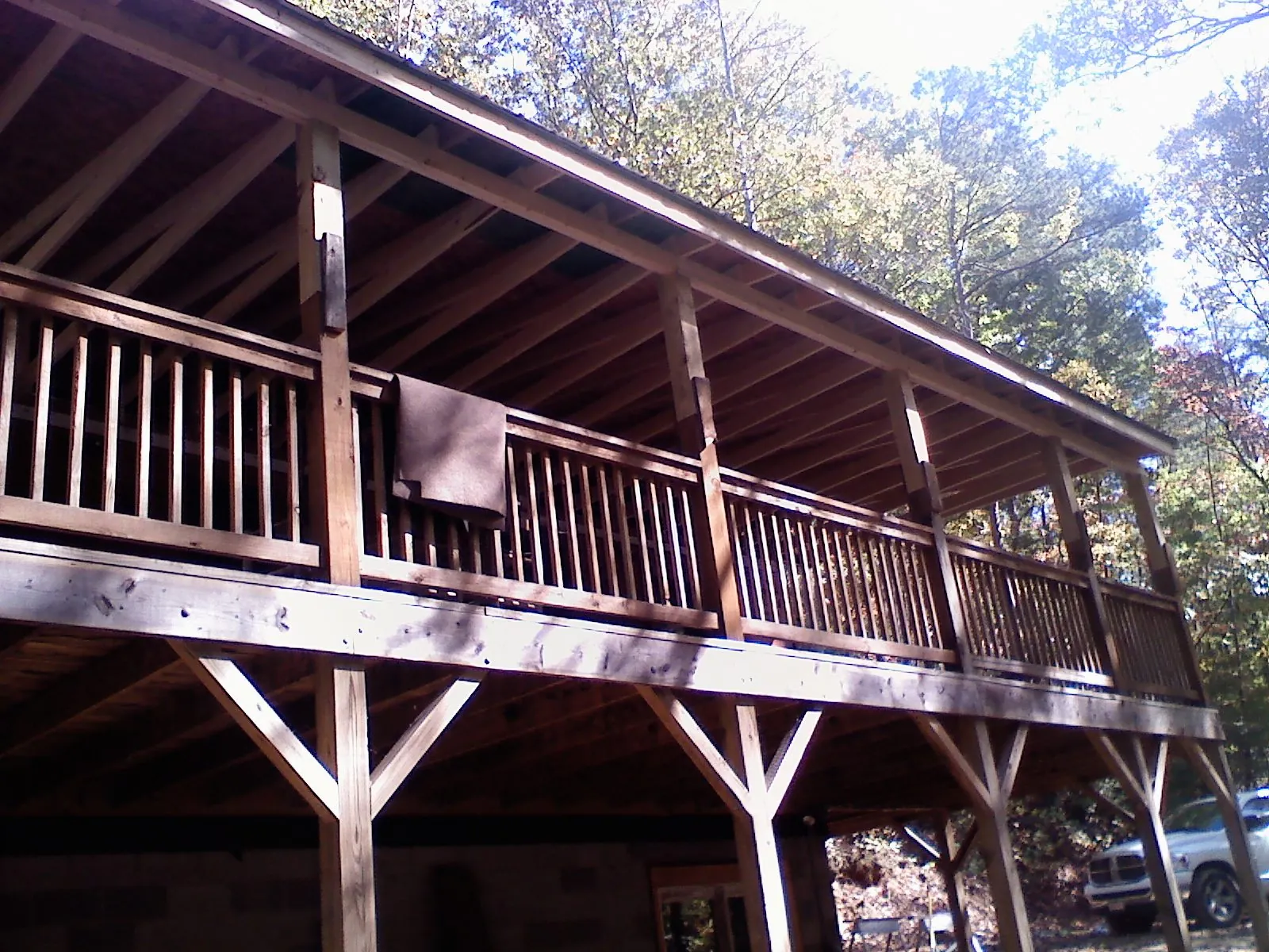 Timber framing under a new elevated porch and deck — Roof Leak Repair in Port Charlotte by Roofing Brothers